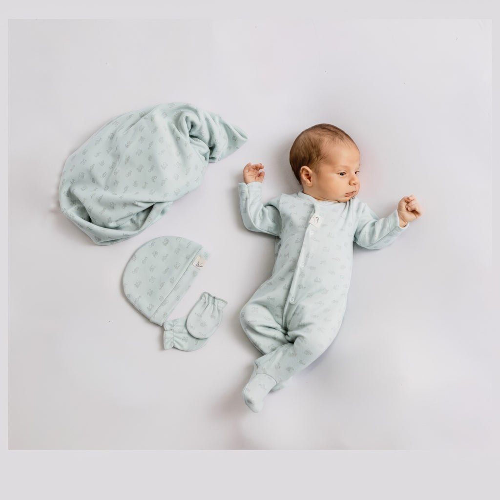 Pelele Petites Maisons – verde – en un niño